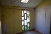 4. Zimmer - Sanierungsbedürftiges Reihenendhaus auf Erbpachtgrundstück mit Garage und Keller in OS-Schinkel